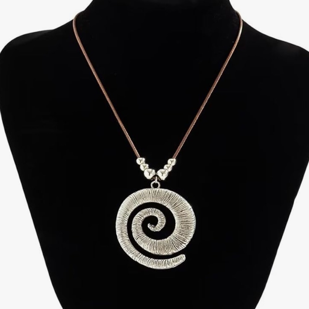 - Conch seashell inspired necklace